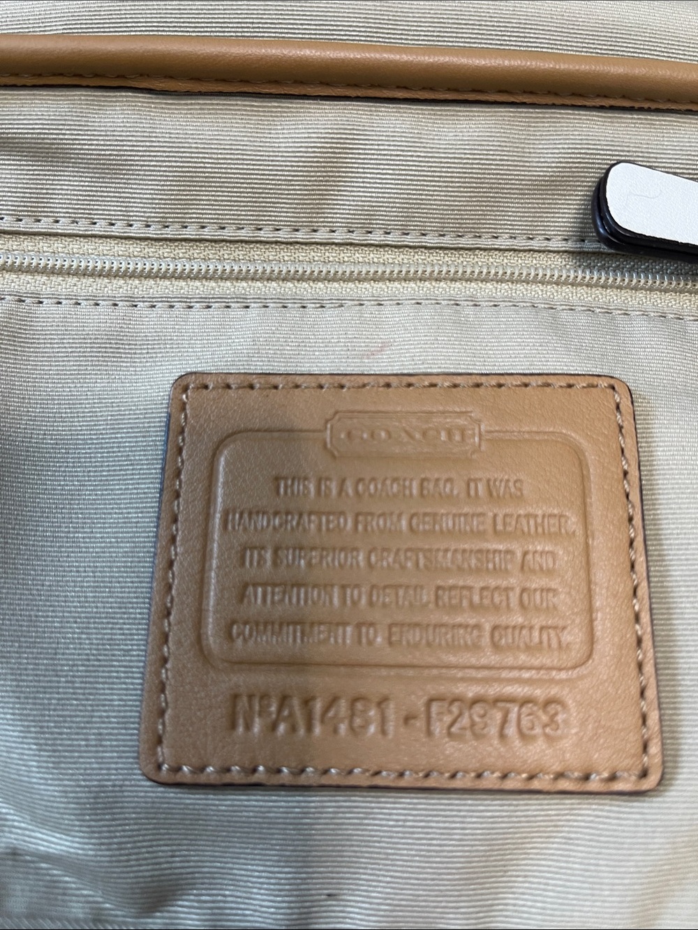 Coach Hadley leather crossbody bag in a navy, tan, and white colorblock design. - Picture 5 of 11